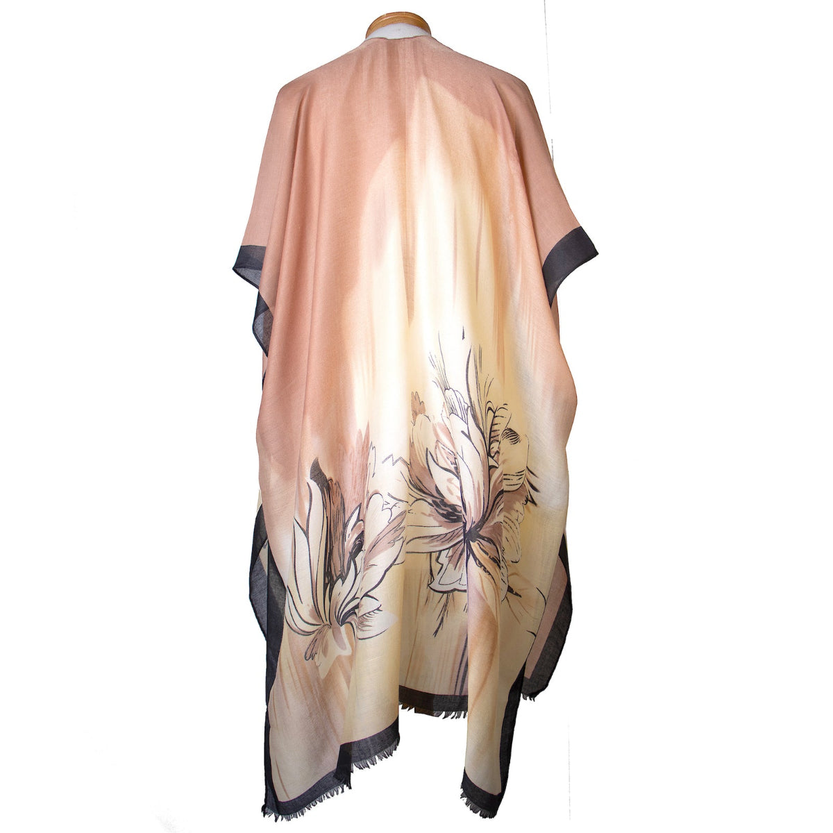 Neutral coloured kimono with floral patterns on a mannequin against a white background