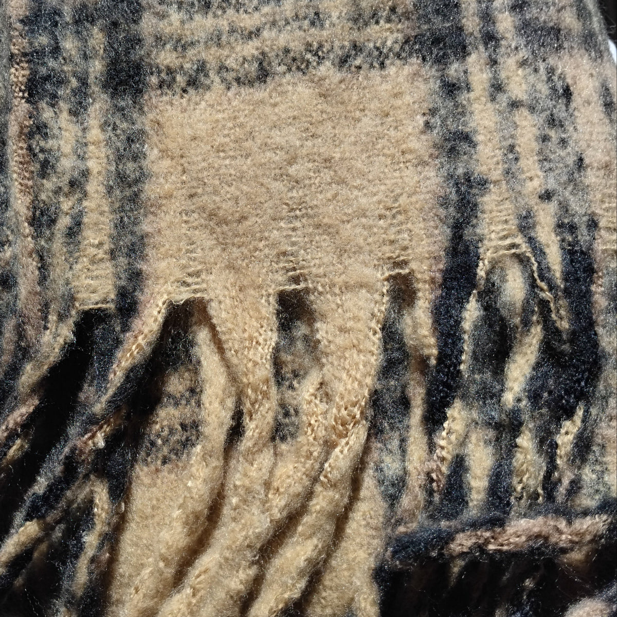 Brown Plaid scarf with chunky tassels.