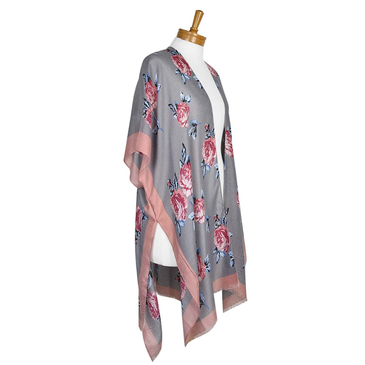 Floral patterned kimono on a mannequin against a white background
