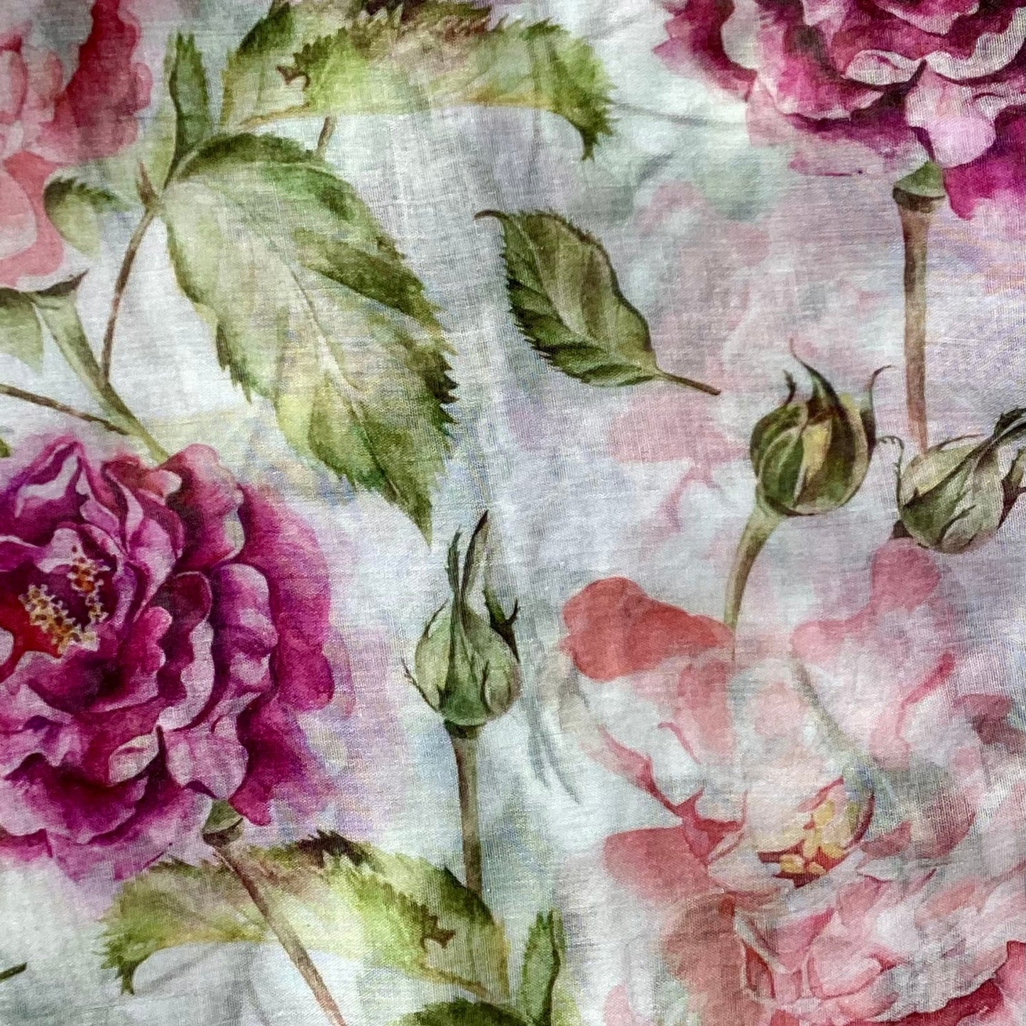 Floral pattern with pink and purple flowers on a light background