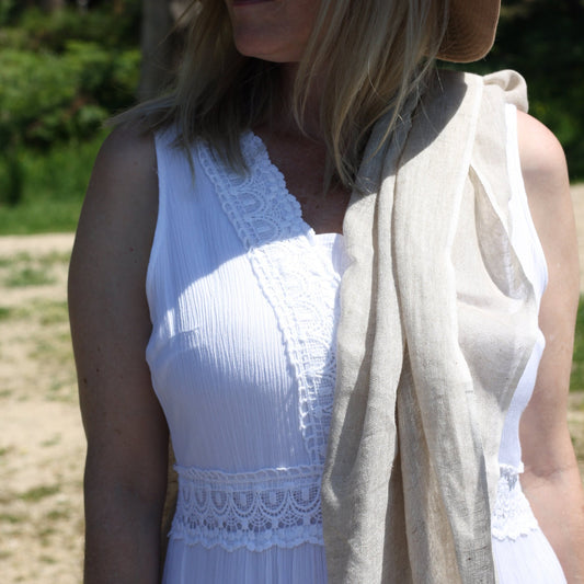 a model wearing a natural linen ladies scarf