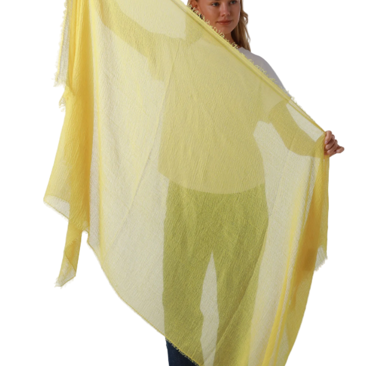 Woman holding a yellow scarf against a white background