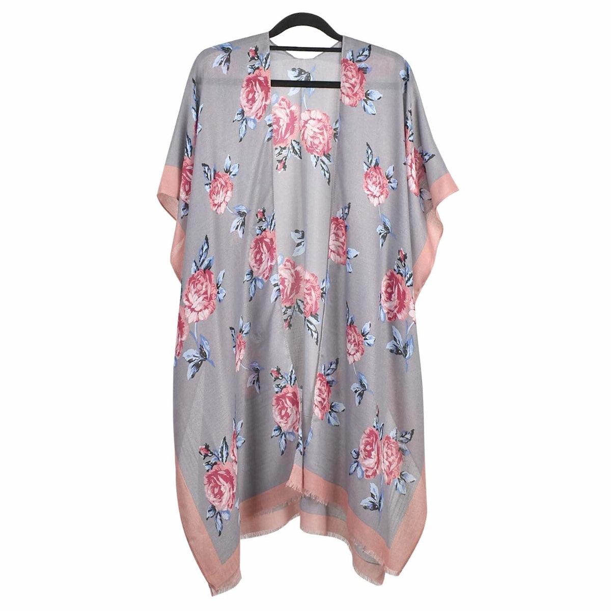 Floral-patterned kimono on a hanger against a white background
