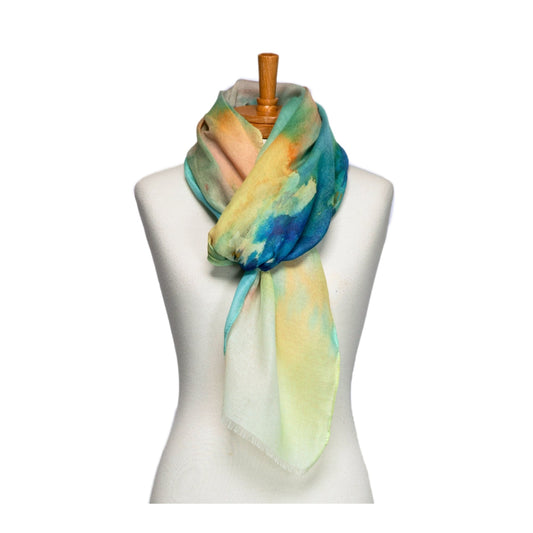 Colorful scarf on a mannequin against a white background