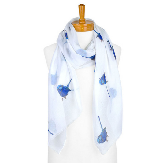 A cotton ladies scarf that has a white background and  medium sized blue Splendid Fairy Wrens. 