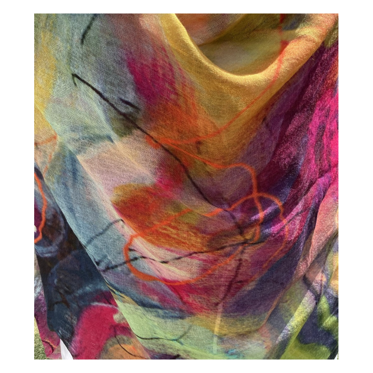 Colorful scarf with abstract patterns on a white background