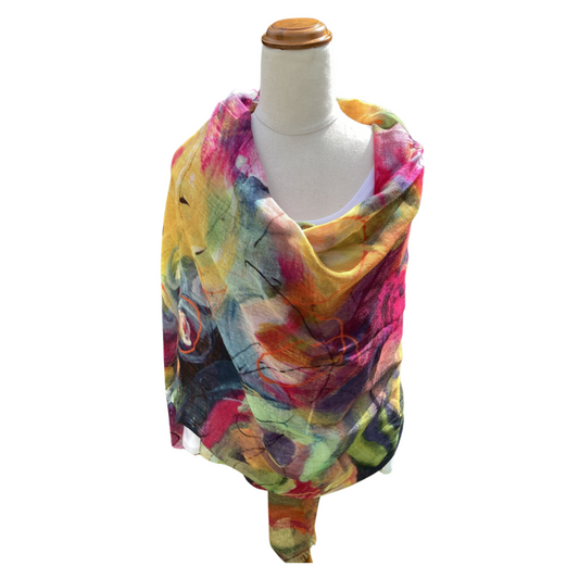 Colorful scarf on a mannequin against a white background