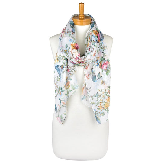 a ladies scarf that has a white background and a pattern of blue birds, brown birds, blue butterflies and pretty flowers in shades on pale yellow and pink