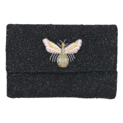 Black beaded clutch with a bee design on a white background