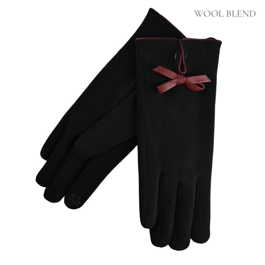 Black gloves with a dark red bow on a white background