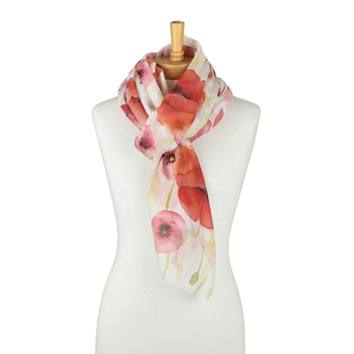 Floral scarf on a mannequin against a white background