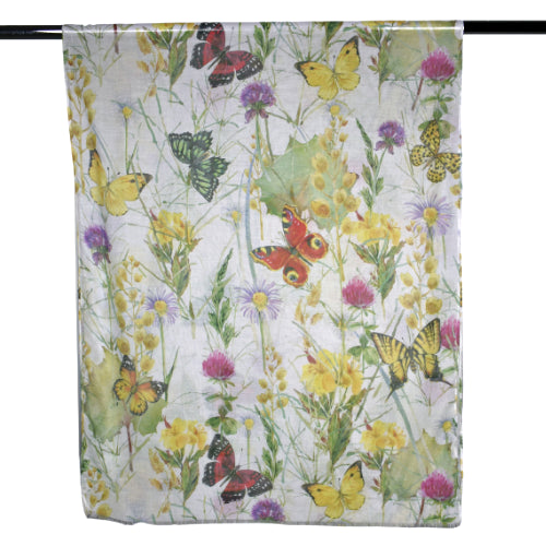 a close up picture of a Ladies scarf that has a white background and an all over pattern of butterflies and flowers in colours of yellow, red, green, pink, and green