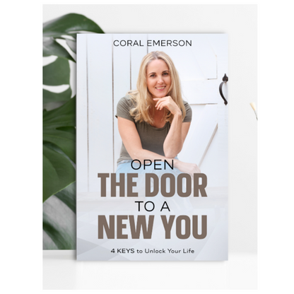 Book cover with a woman's portrait and text 'Open the Door to a New You' by Coral Emerson.
