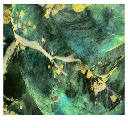 Close-up of a green fabric with floral patterns