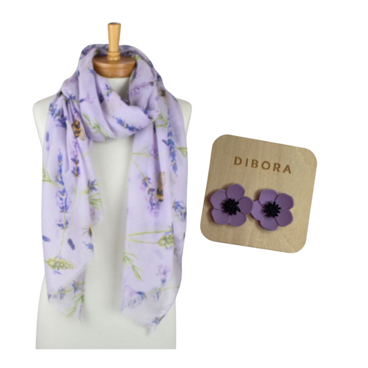 Lavender scarf on a mannequin with purple Dibora flower earrings on a white background