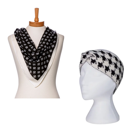 Black and white patterned scarf on a mannequin and headband on a mannequin head against a white background