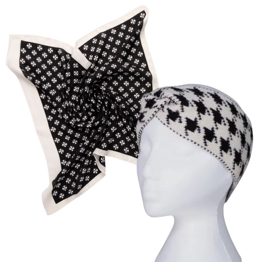 Black and white patterned headscarf and beanie on a mannequin head against a white background