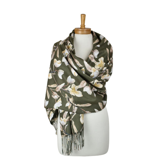 Floral patterned scarf with fringe on a mannequin against a white background
