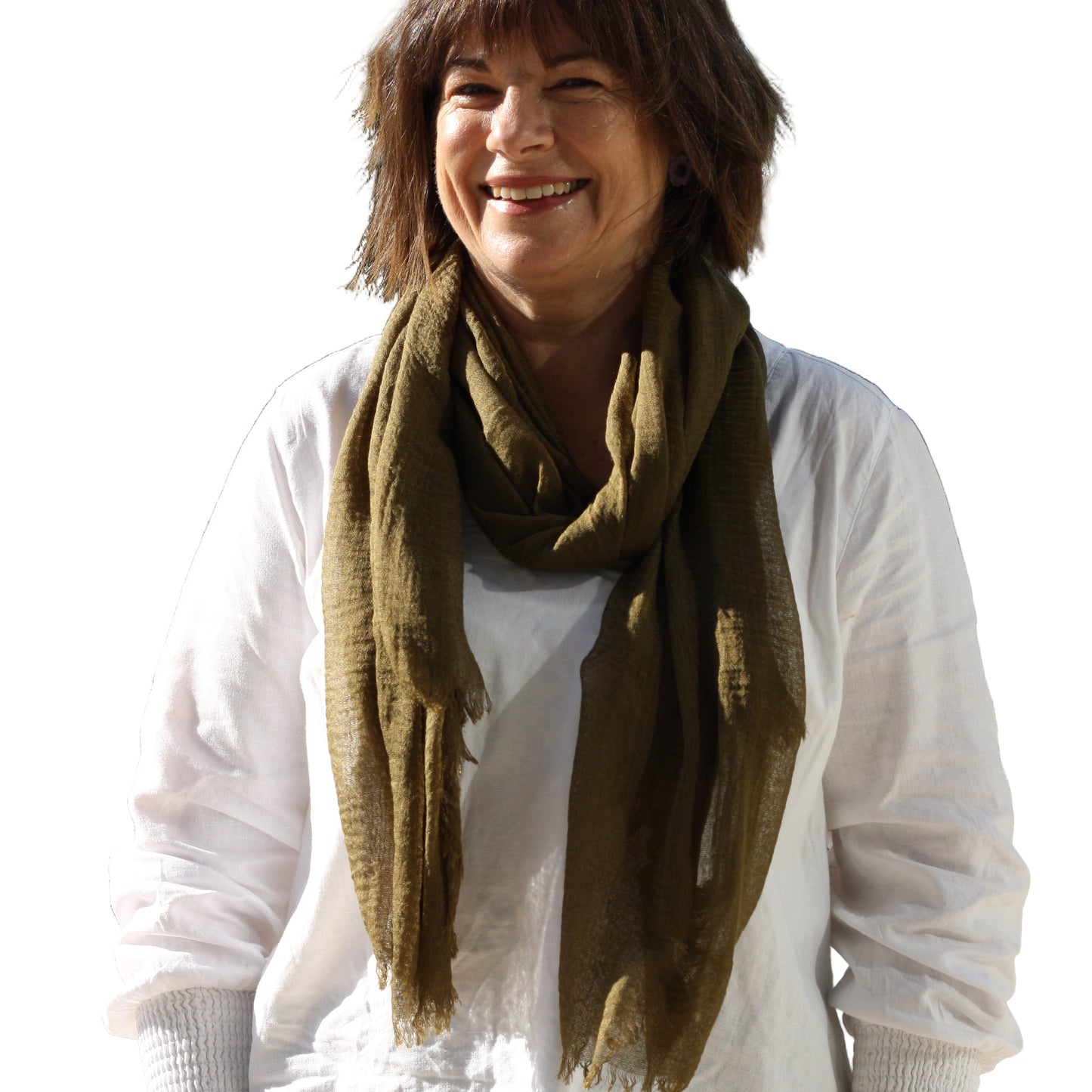 Woman wearing a white shirt and green scarf on a white background