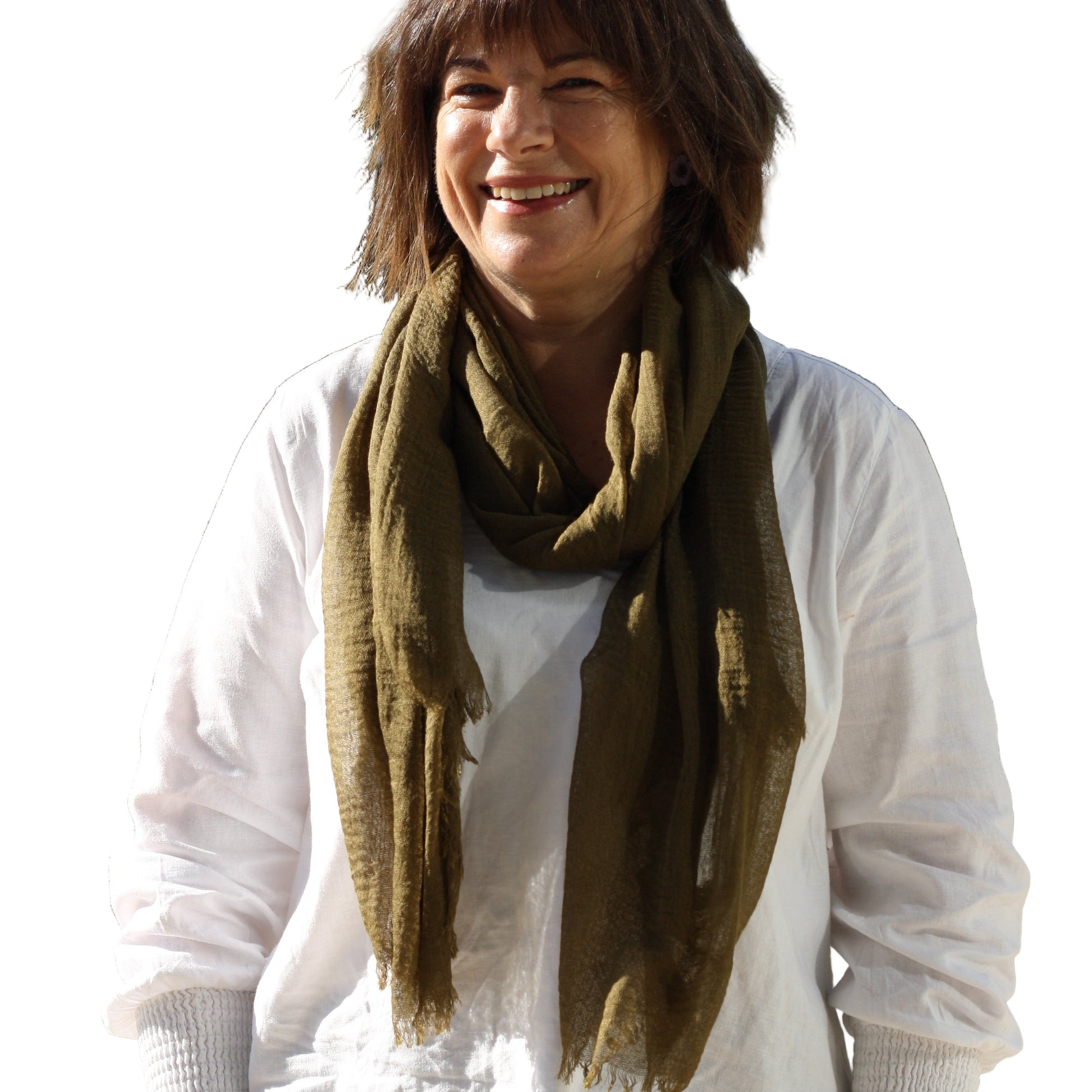 Woman wearing a white shirt and green scarf on a white background