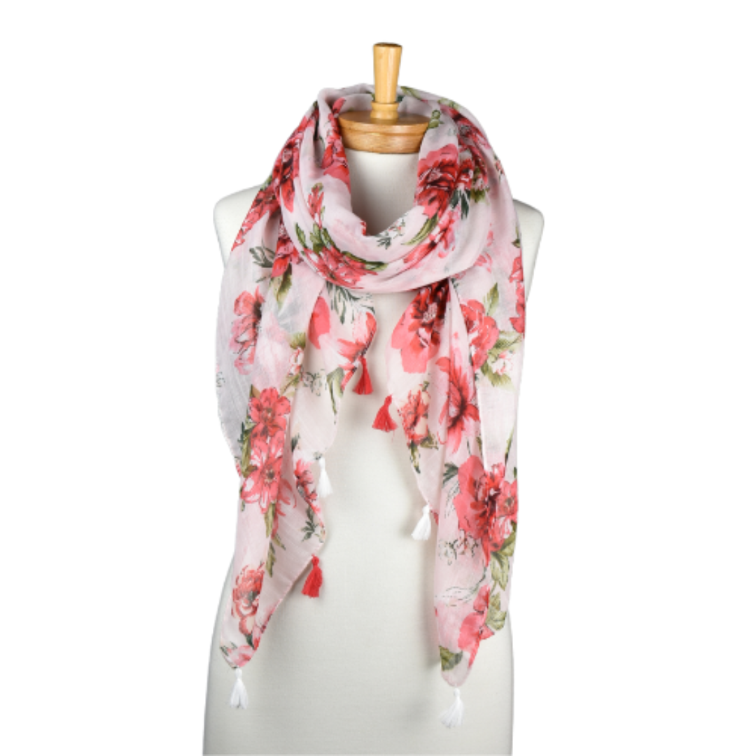 a pretty ladies scarf with a pale pink background and pink flowers and green leaves