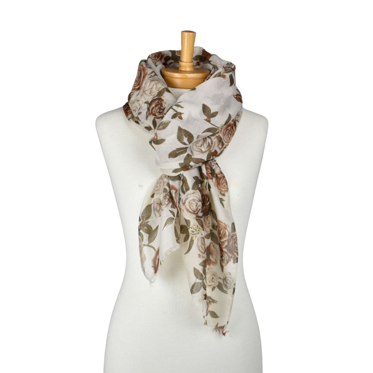 Floral scarf on a mannequin against a white background