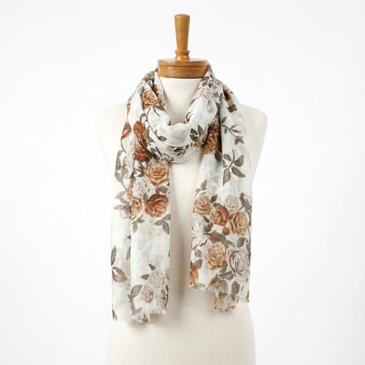 Floral scarf on a mannequin with a white background