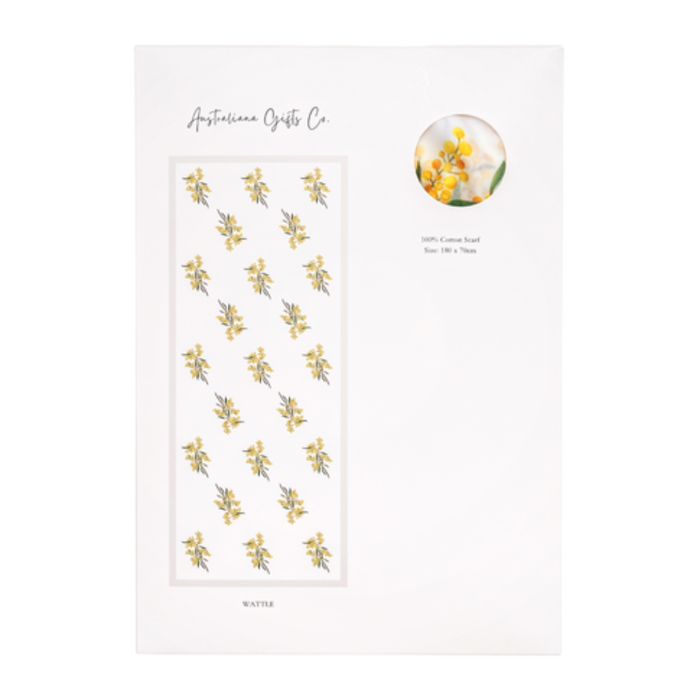 a ladies scarf that has yellow wattle flowers on a white background and packaged in a slim white box