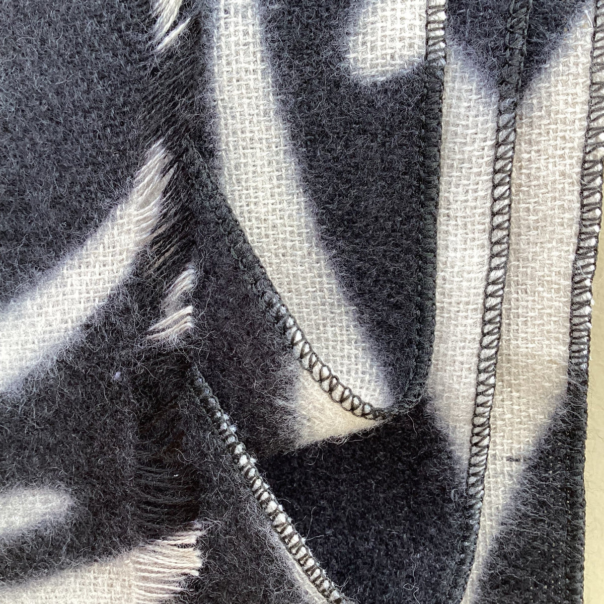 Close-up of a black and white zebra patterned scarf
