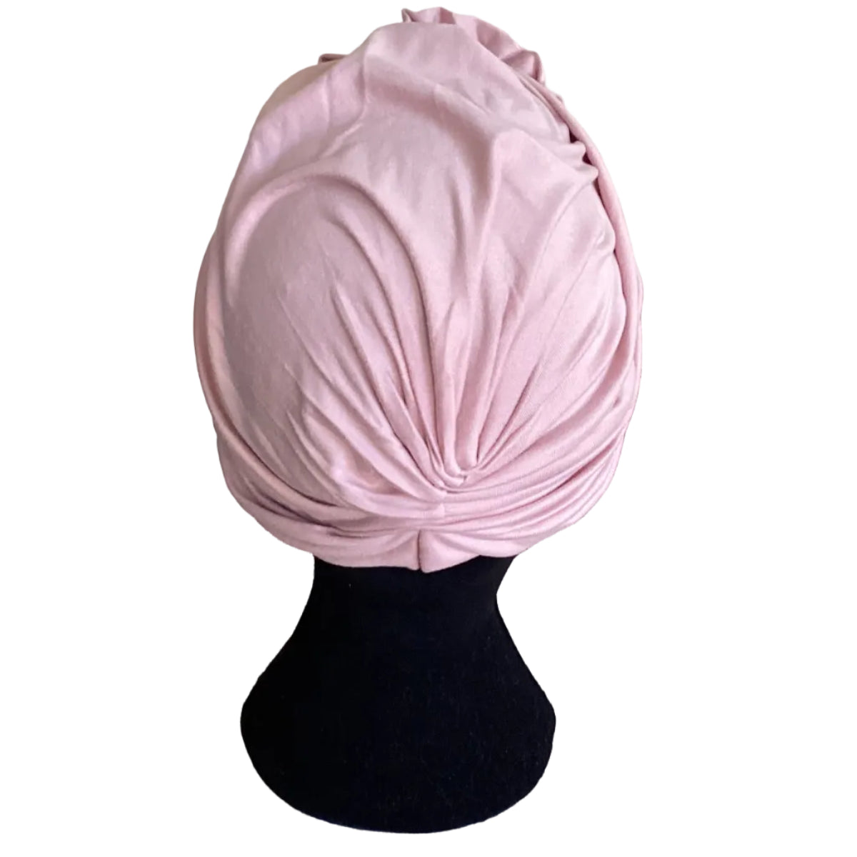 rear view of a pink hair turban on a black head mannquin