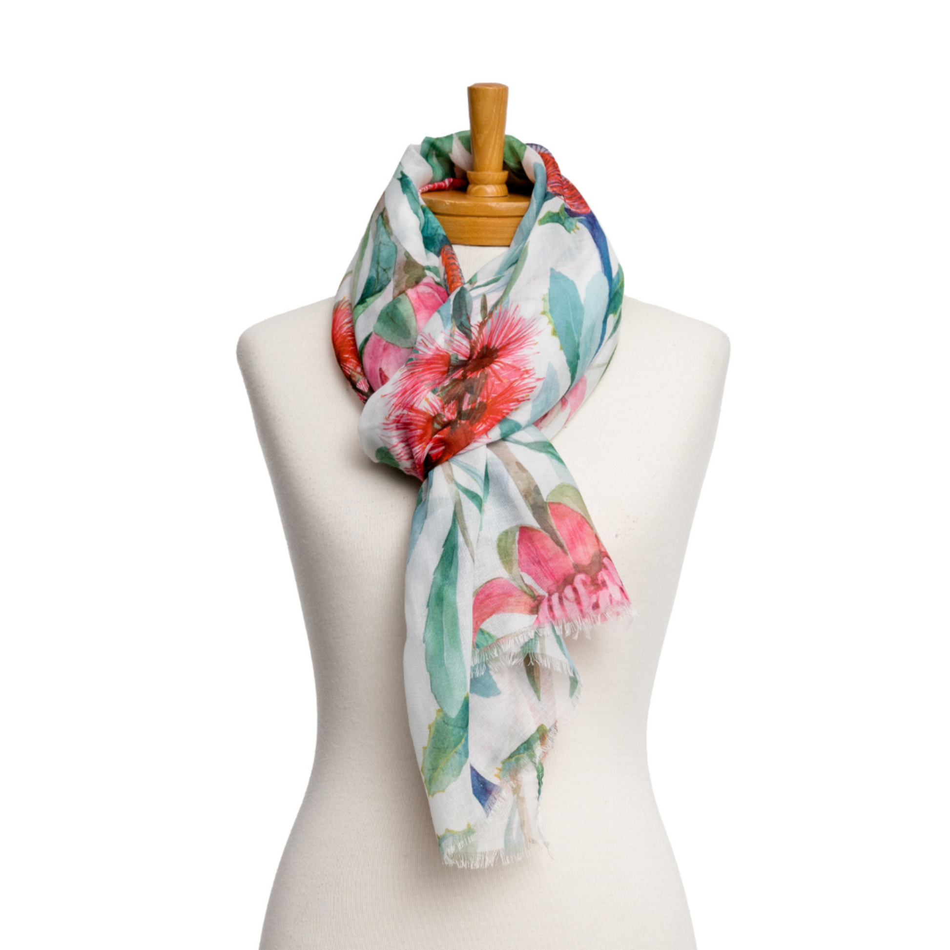 a pretty ladies scarf that has pink and red Australian Bush Flowers and green leaves on a white background