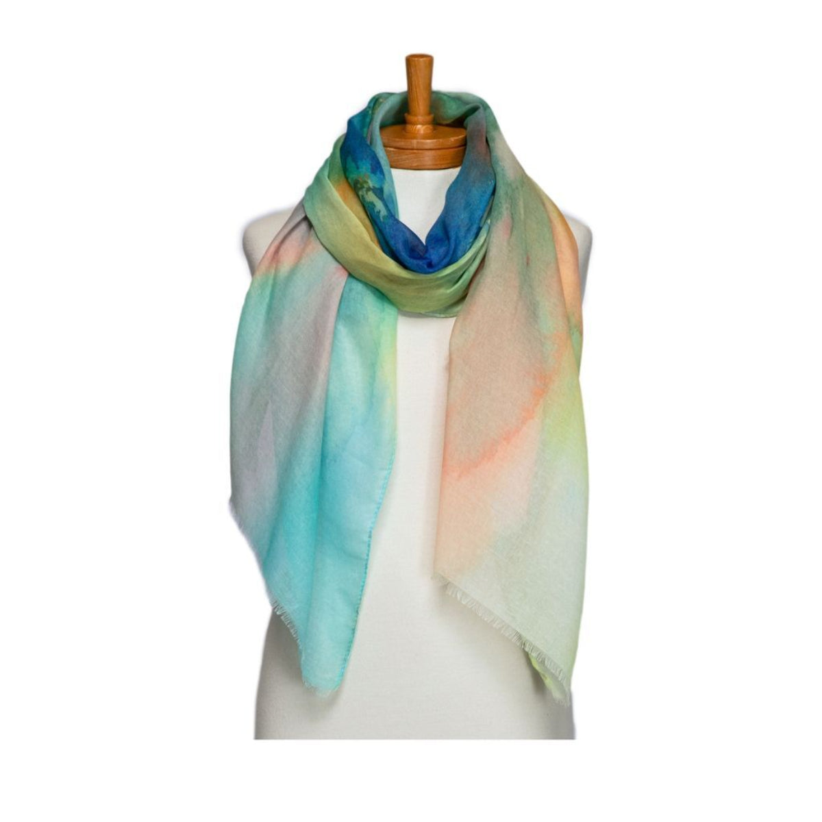 Colorful scarf on a mannequin against a white background