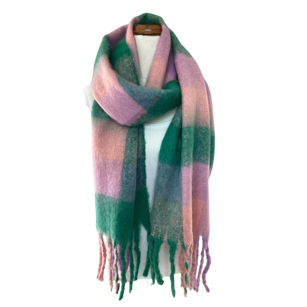 a large oversized blanket scarf with chunky tassels