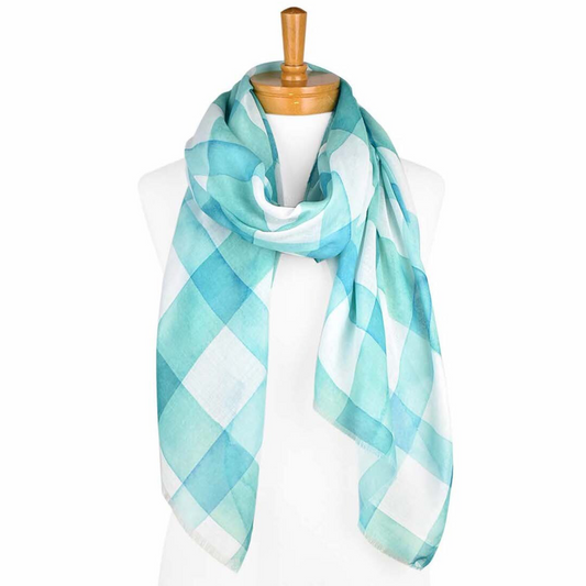 a ladies scarf with a white background and mint green gingham checked pattern