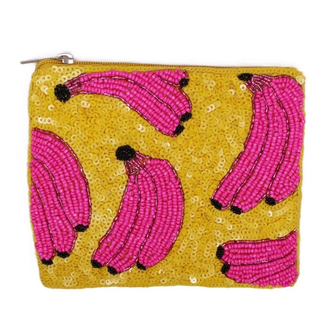Pouch with pink banana design on a yellow sequined background
