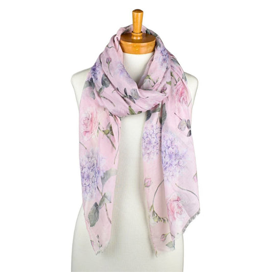 Floral Hydrangea and Rose patterned scarf on a mannequin against a white background