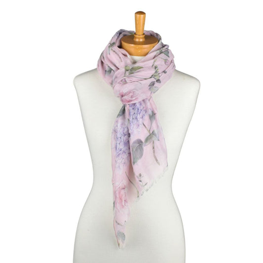 Floral scarf on a mannequin against a white background