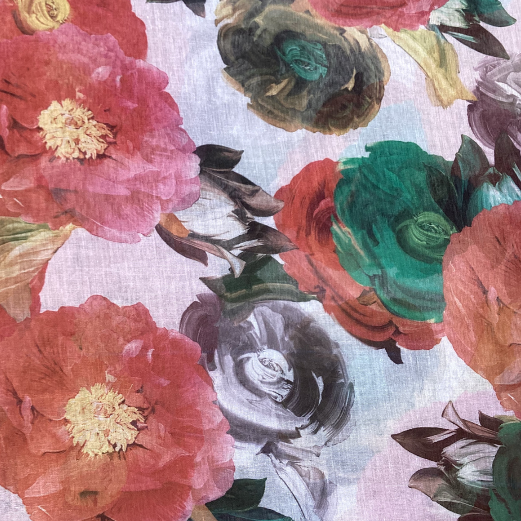 a close up picture of a ladies scarf with large roses and flowers in shades of red, emerald green and grey